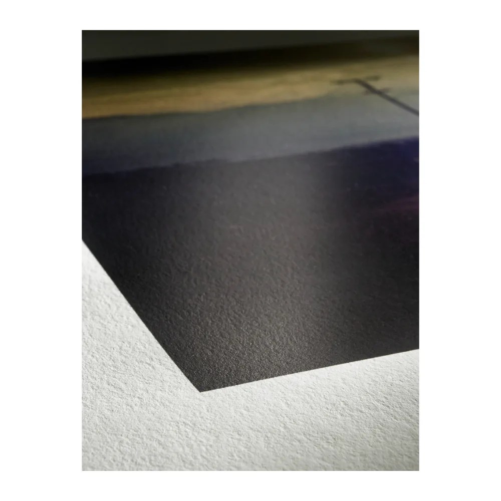 Zbliżenie powierzchni papieru Hahnemühle Photo Rag Satin 310 g/m² z wydrukiem